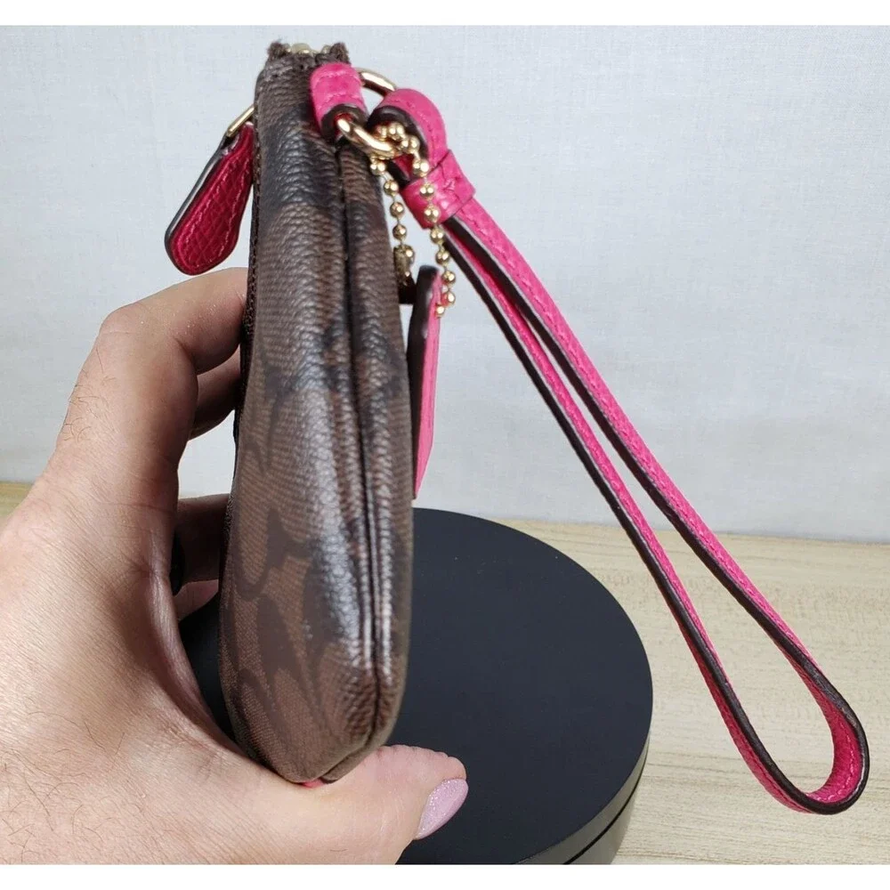 COACH Corner Zip Wristlet In Dark Brown Signature Leather w/ Hot Pink Stripe